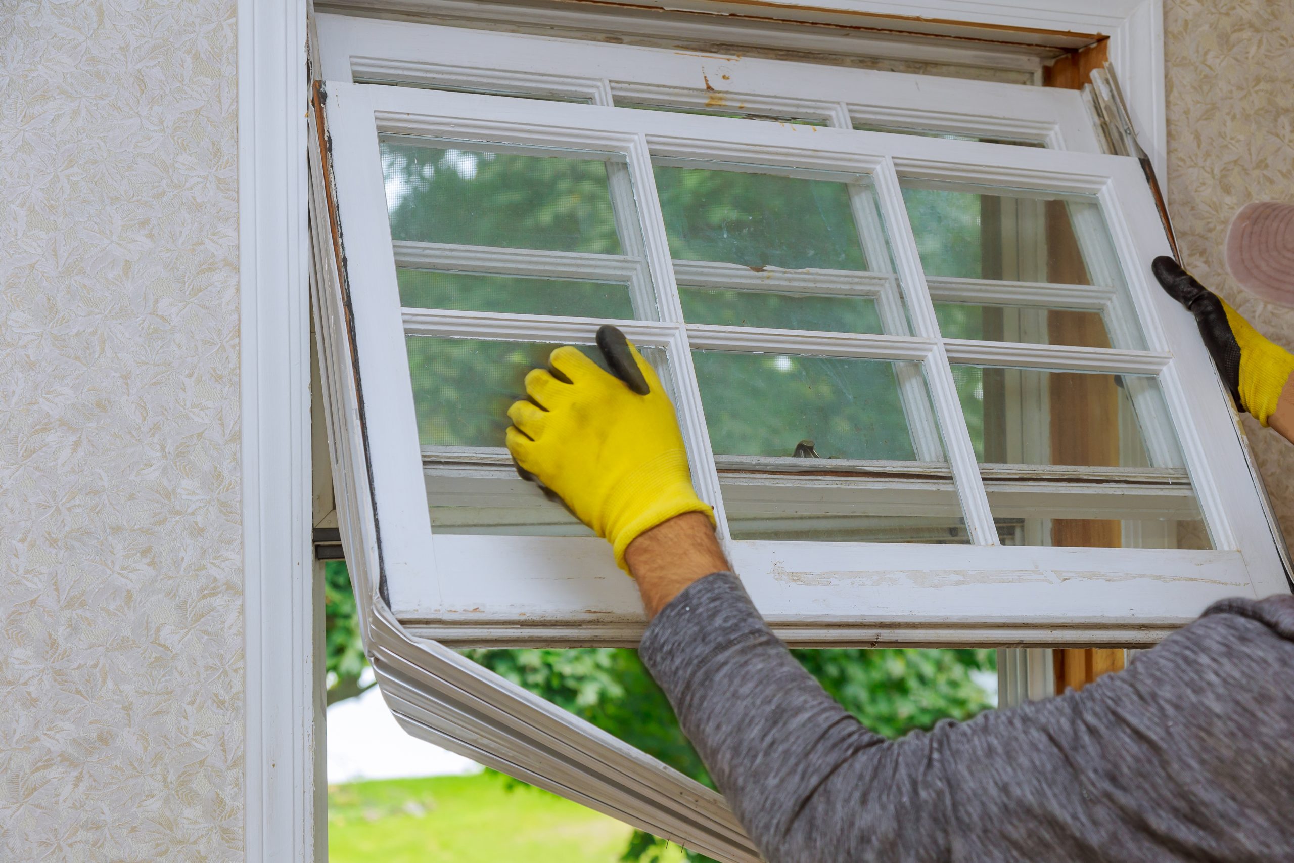 Contractor Installing New Replacement Window